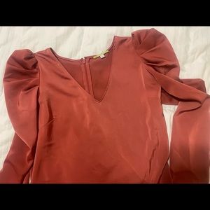 Gianni Bini size M rust colored silk blouse with fun shoulder detail